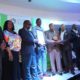 Newcastle Mayor Makhosini Nkosi and his team receiving the award from MEC of public works Ravi Pillai